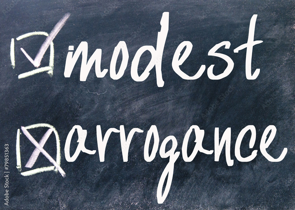 Fototapeta premium modest and arrogance sign on blackboard
