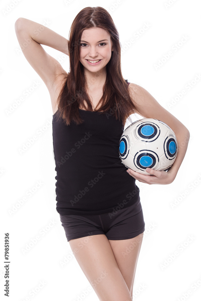 healthy and sporty young woman with football. healthy and sporty young woman with football.