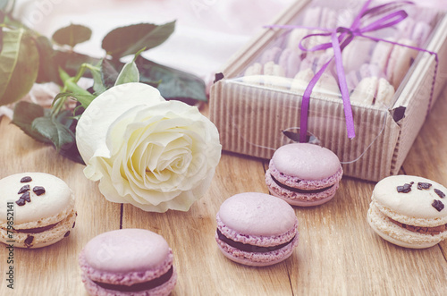 Lilac macaroons with rose and gift box