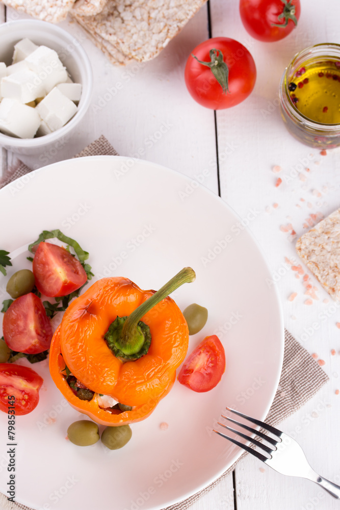 Plate with baked stuffed peppers. Plate with baked stuffed peppers.