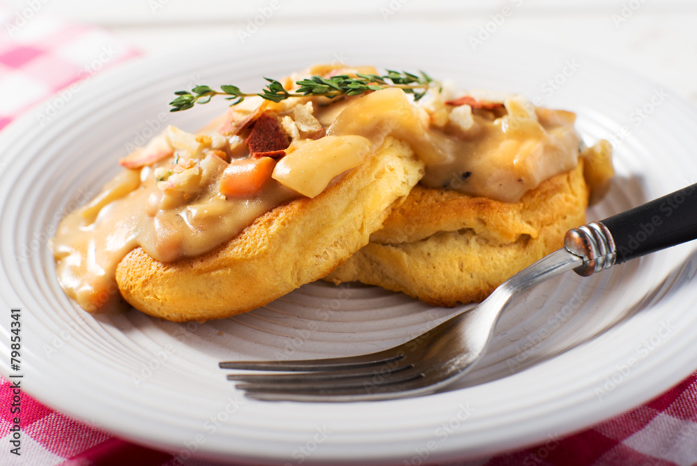 vegetarian Biscuits and gravy on a white plate vegetarian Biscuits and gravy on a white plate