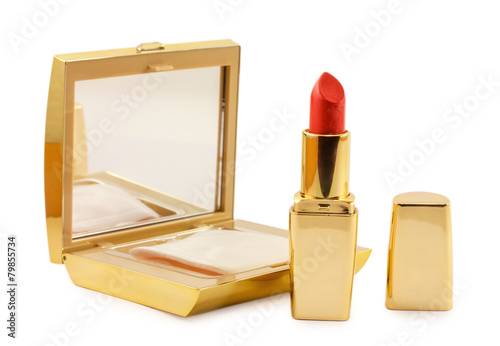 gold lipstick and powder isolated on white background