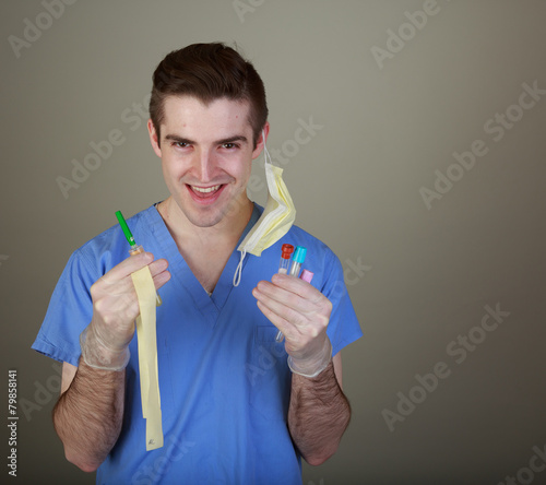 Handsome young phlebotomist photo