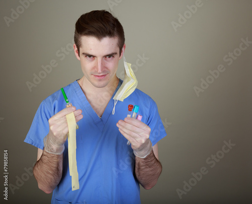 Handsome young phlebotomist photo