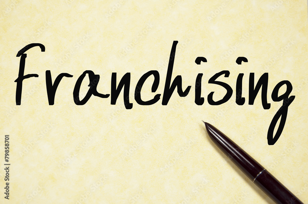 franchising word write on paper franchising word write on paper
