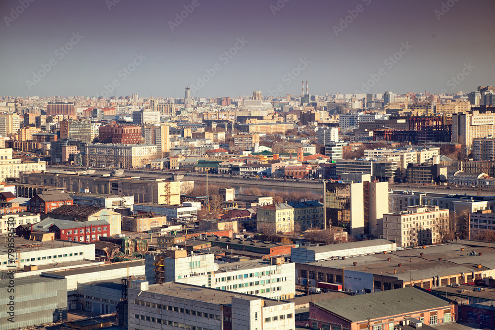 Dense buildings in the industrial area. Rooftops