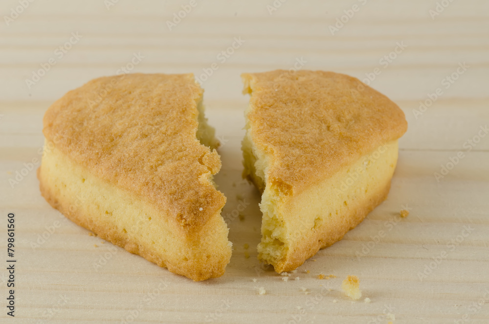 Broken heart cookies on wooden background Broken heart cookies on wooden background