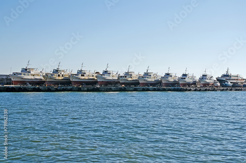 Pleasure boats on the pier in Yalta