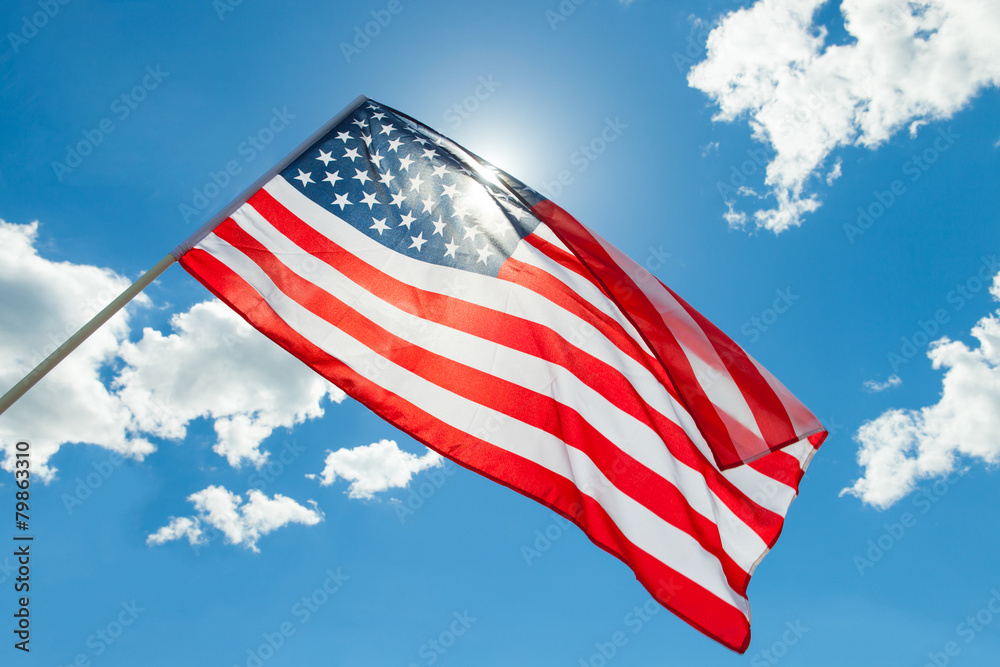 Fototapeta premium USA flag with clouds - outdoors shoot