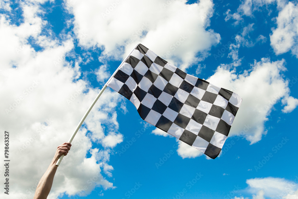 Checkered flag waving in the wind - outdoors shoot
