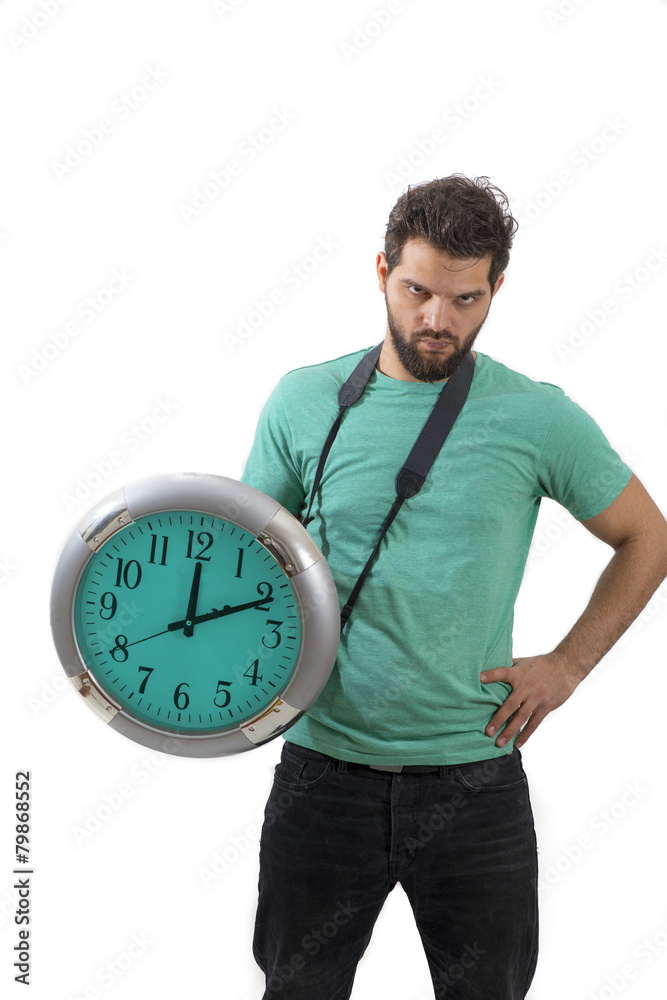 Portraitt of an angry male holding big clock running out of time Portraitt of an angry male holding big clock running out of time