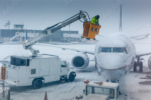 Air plane in winter weather at an airport