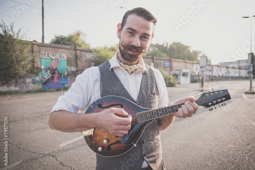 Konstfotografi handsome big moustache hipster man playing mandolin