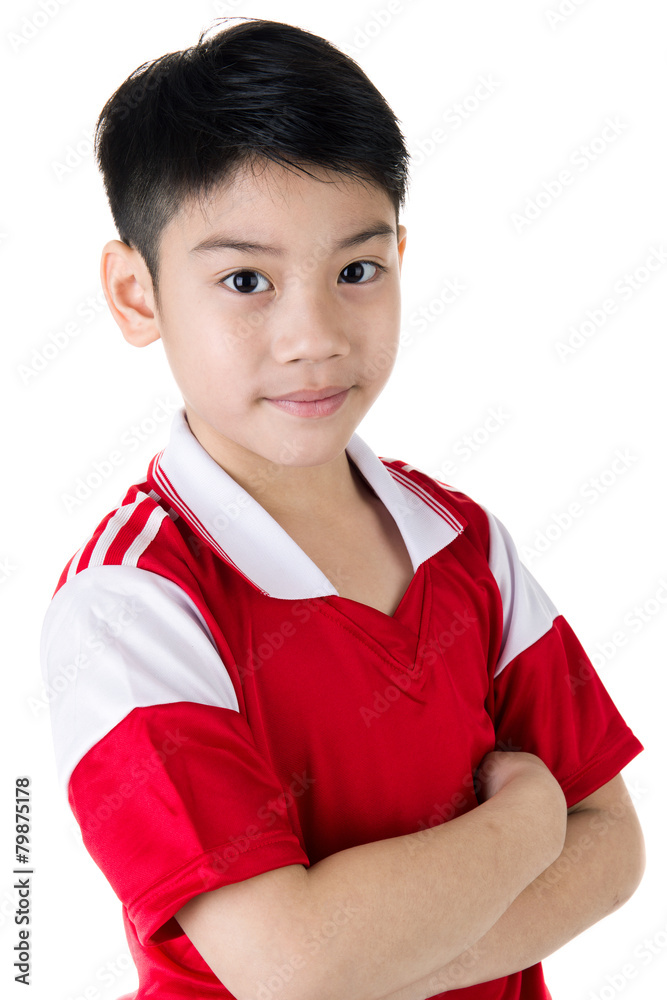 Portrait of Happy asian cute boy in red sport uniform Portrait of Happy asian cute boy in red sport uniform