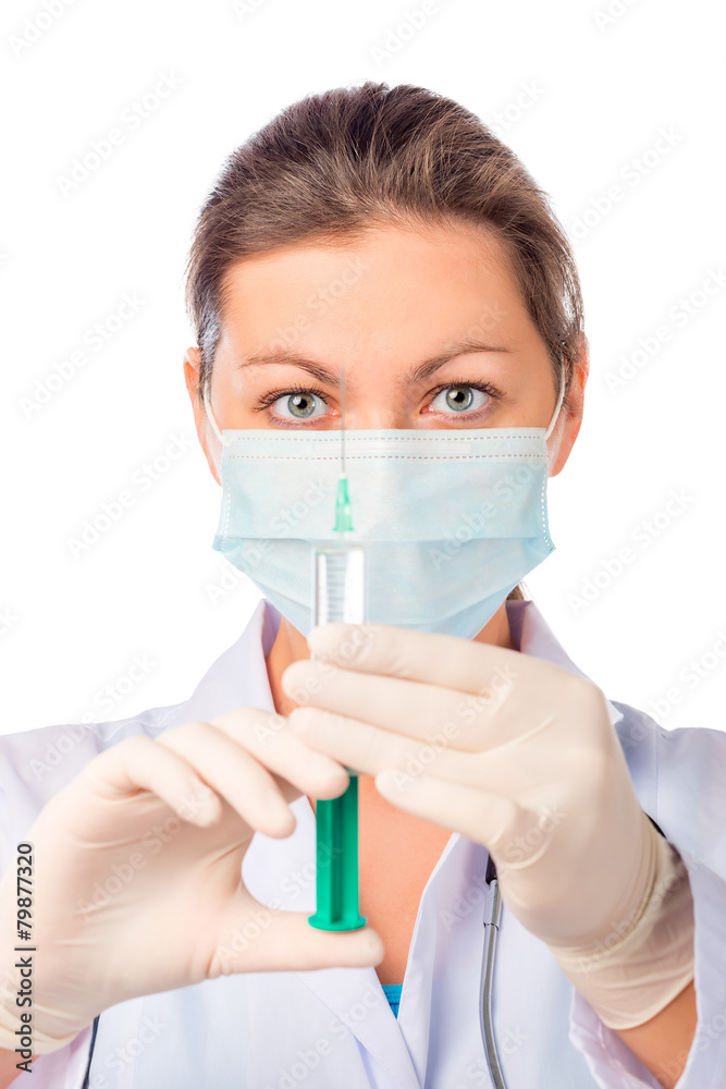 Treatment nurse with the vaccine in the syringe