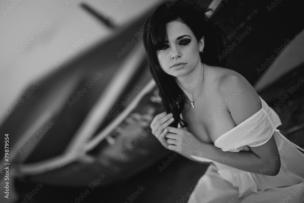 Fototapeta premium beautiful woman in a boat black and white