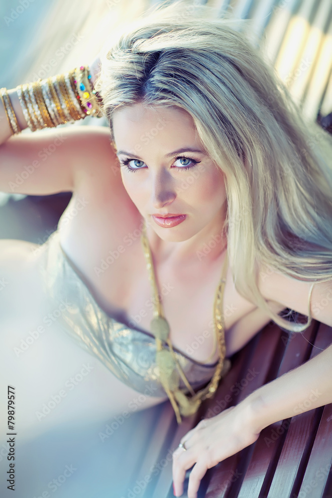 Fototapeta premium sexy woman are relaxing on a beach alone