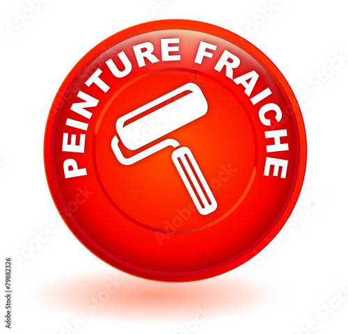 peinture fraiche sur bouton rouge