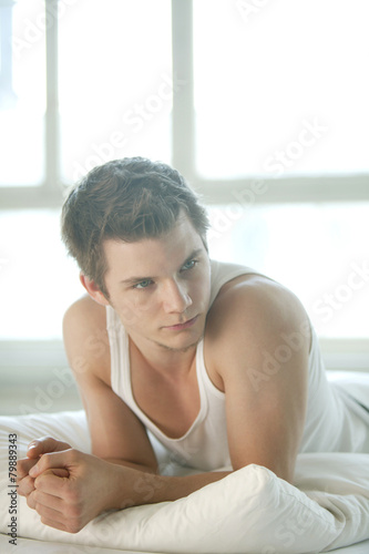 Free Download thoughtful young man relaxes - GFXLoad