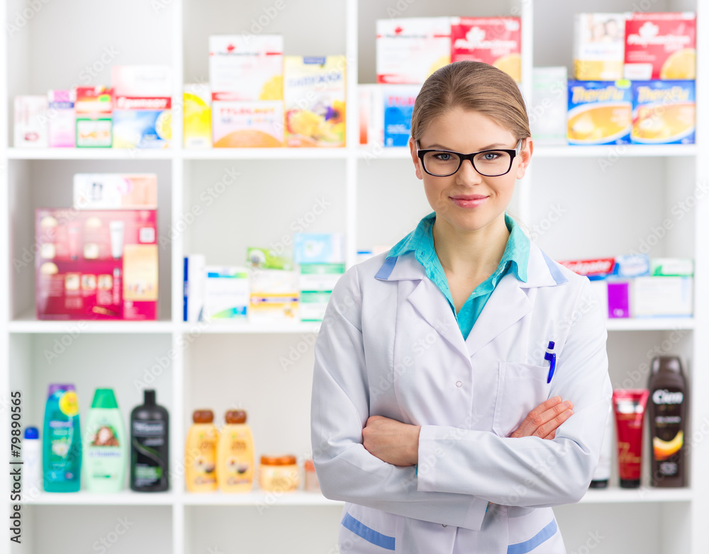 Confident woman pharmacist selling medicines and cosmetics