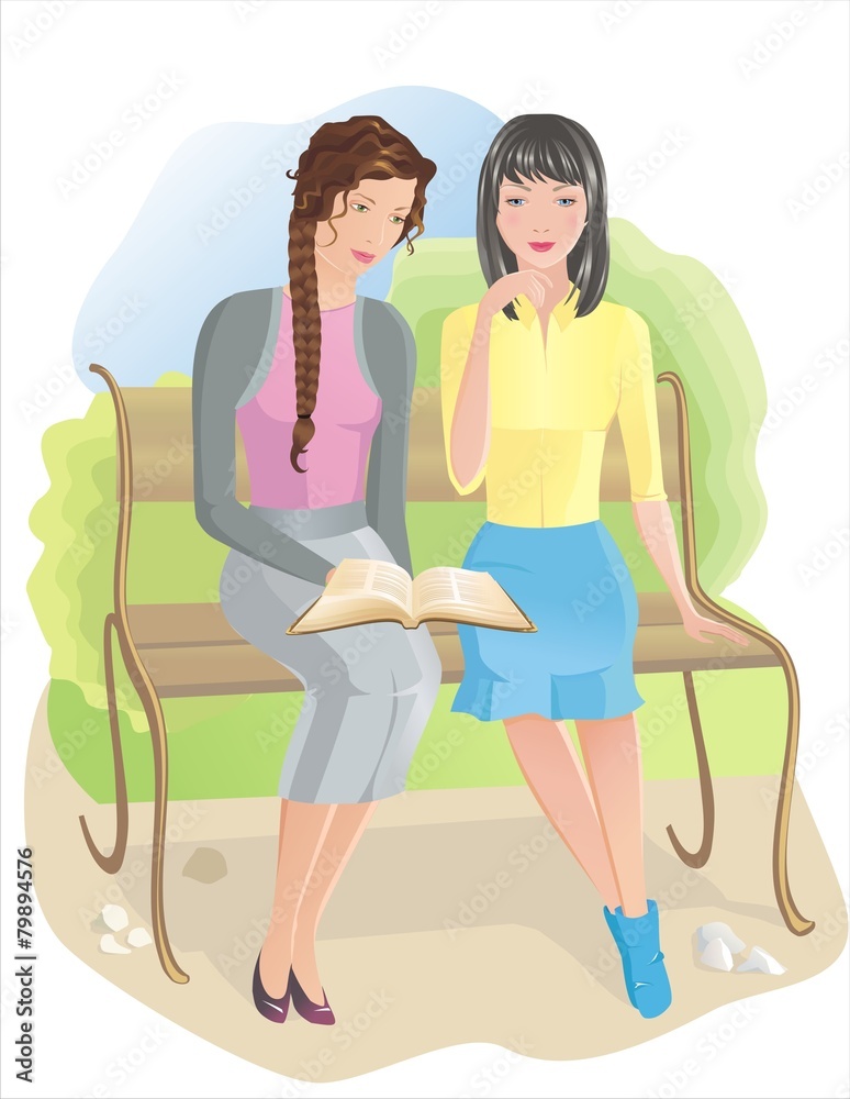 Two girls with Bible outdoor