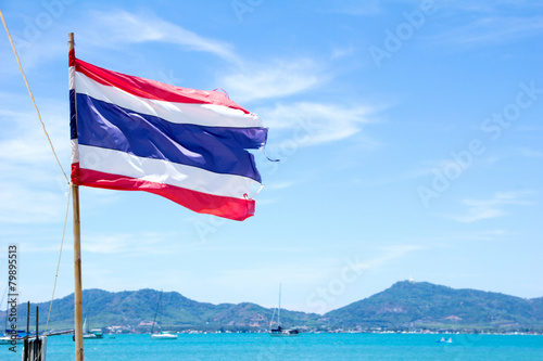 Thai flag with blue sky  at phuket