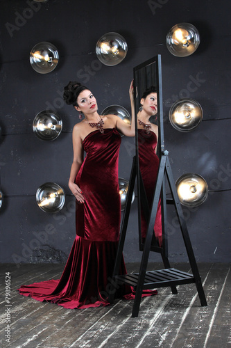 Lady in red and magic mirror