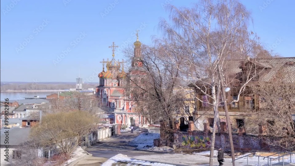 Old houses on the street next to the church on Nativity Old houses on the street next to the church on Nativity