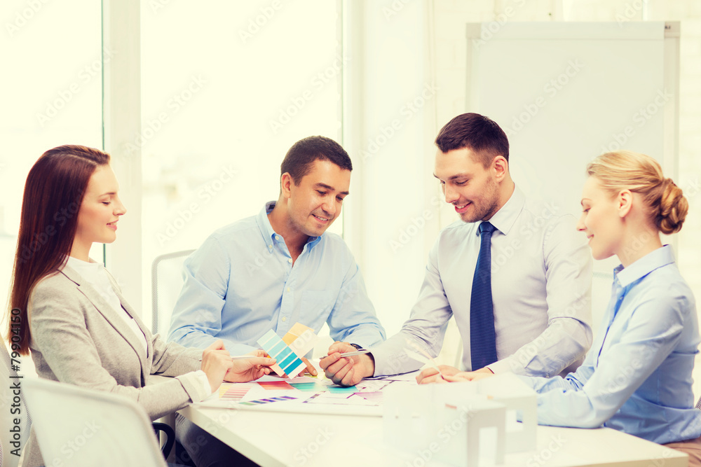 happy team of architects and designers in office happy team of architects and designers in office