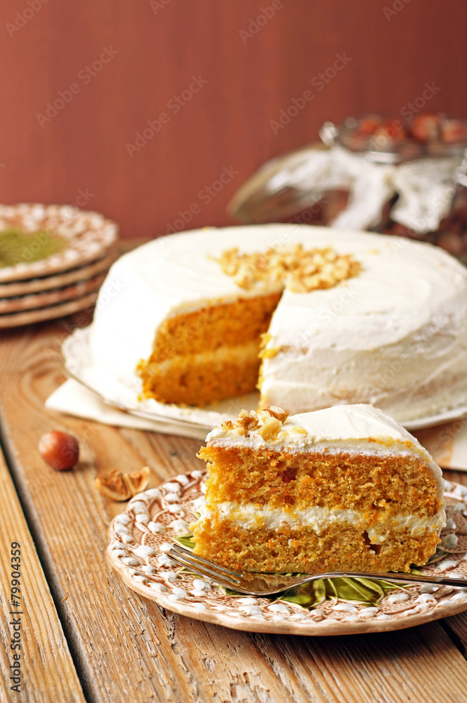 Carrot cake with spices on a wooden table Carrot cake with spices on a wooden table