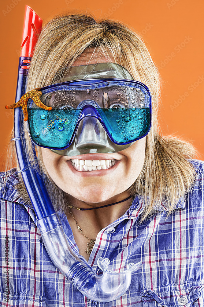 woman with scuba mask,  snorkel and starfish