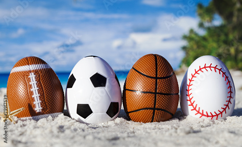 Sport eggs on ocean beach –easter symbol
