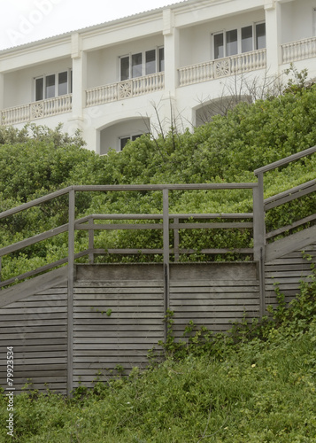 Old grey stairs leading to hotel