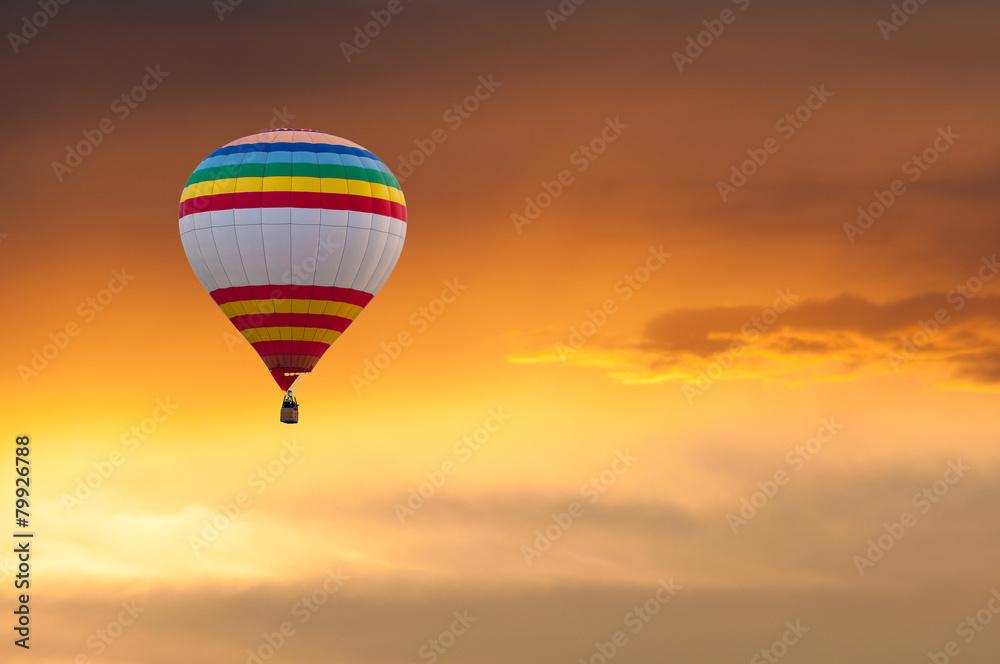 Fototapeta premium Hot Air Balloon in Flight on sunset sky background. Festival of