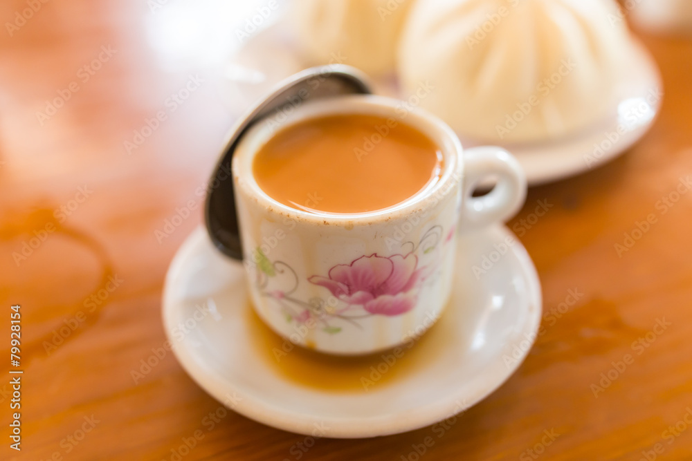 cup of milk tea and steamed stuff bun cup of milk tea and steamed stuff bun