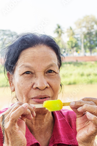 Asian Thai woman eating ice cream