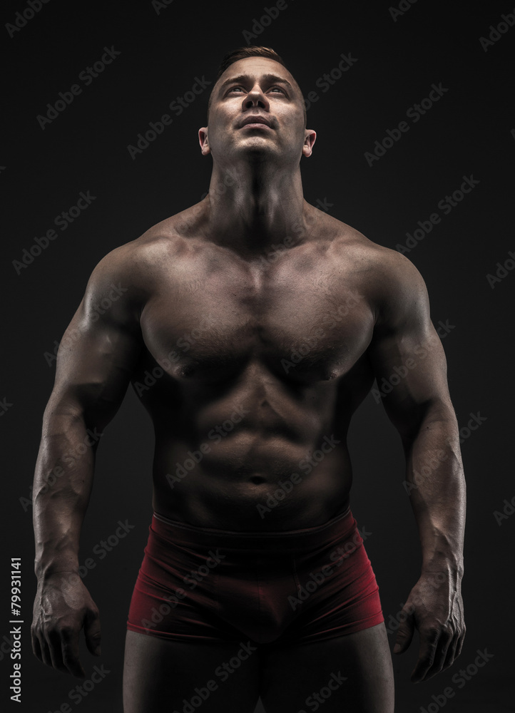 Muscular male in studio Muscular male in studio