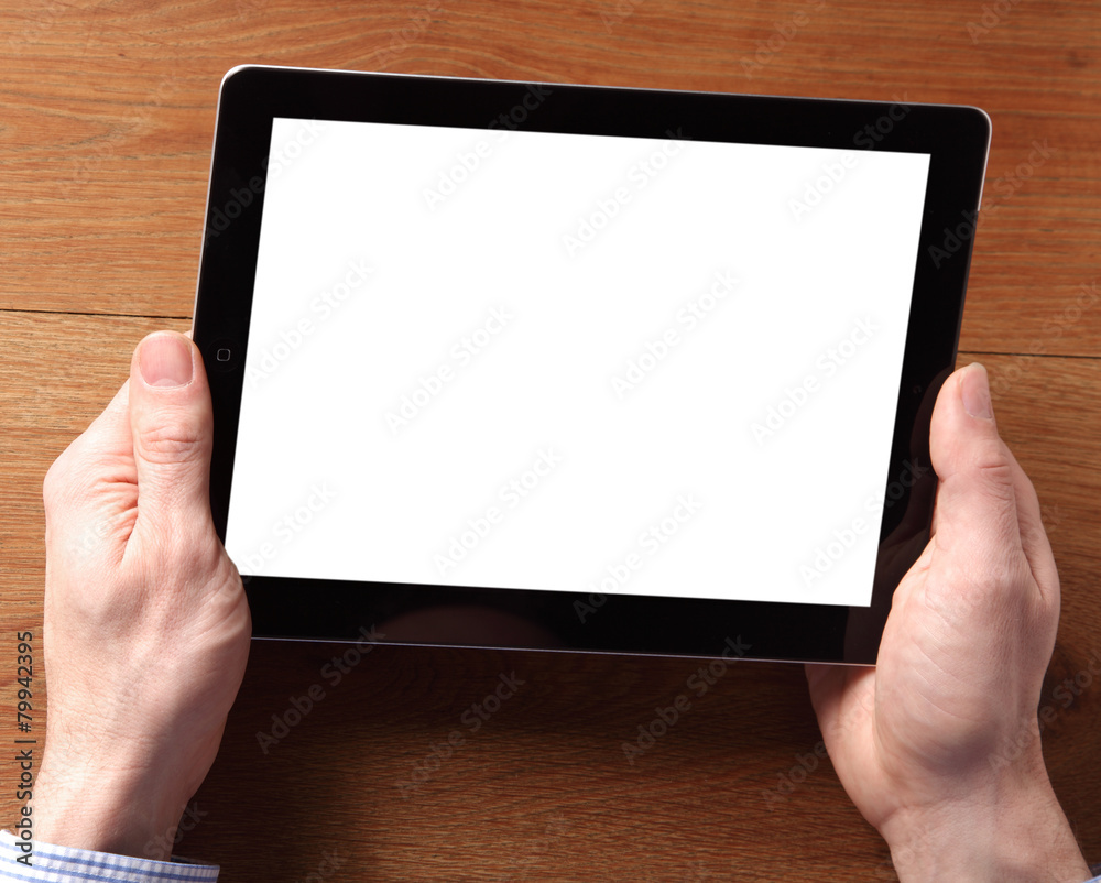 Hand Holding Tablet Device with Empty White Screen