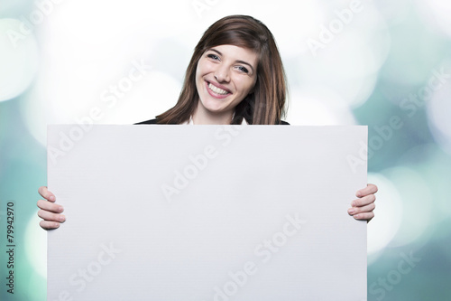 Fotografi young promoter girl with signboard