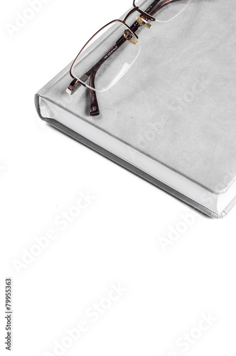 Planner with glasses on a white background isolate