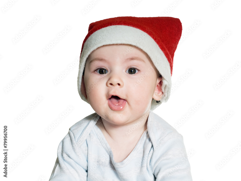 Caucasian baby boy in Christmas hat isolated Caucasian baby boy in Christmas hat isolated