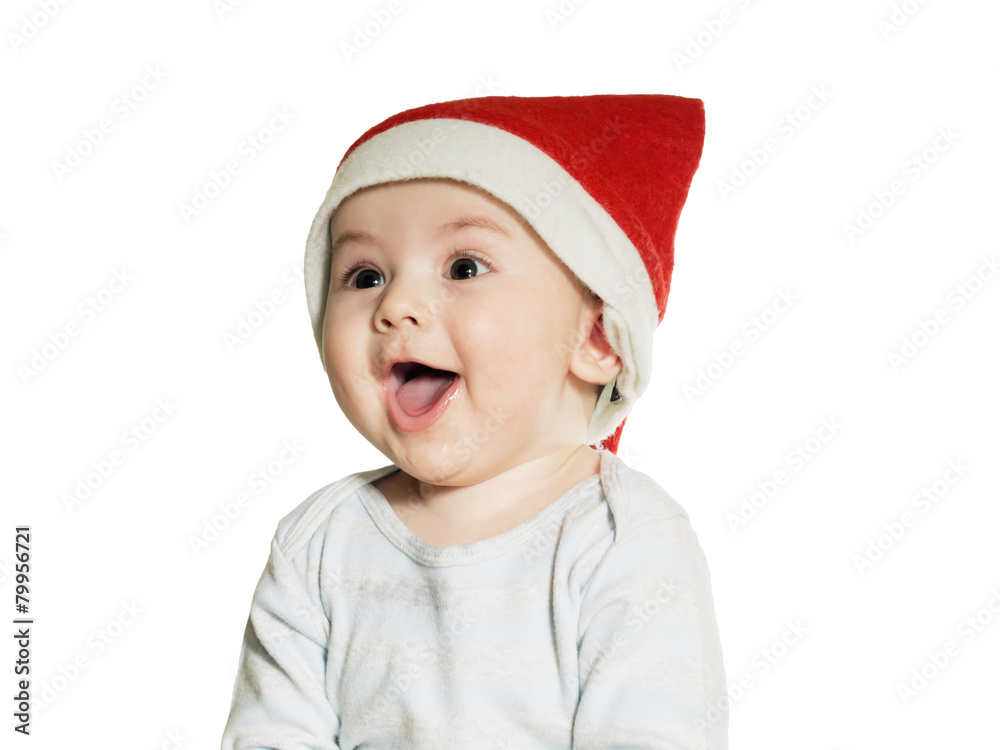 Caucasian baby boy in Christmas hat isolated Caucasian baby boy in Christmas hat isolated