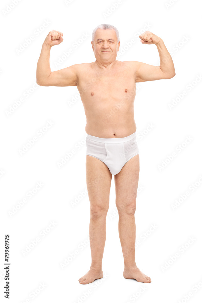 Full length portrait of a senior in underwear showing biceps