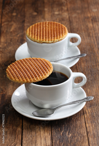 dutch stroopwafel, caramel waffle and coffee photo