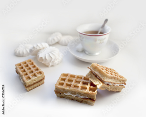 Tea with waffles and marshmallows