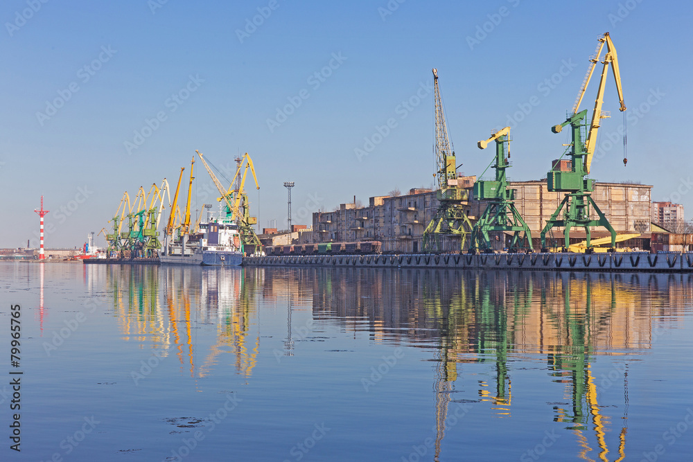 Fototapeta premium port cranes on the shore