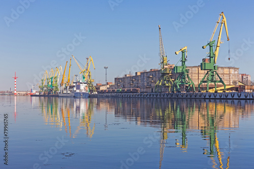 port cranes on the shore