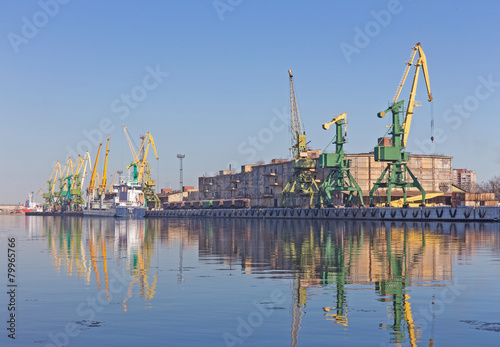 port cranes on the shore