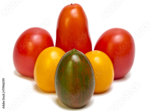 tomatoes of different grades and color