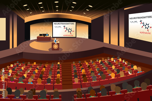 Presentation in a conference in an auditorium photo